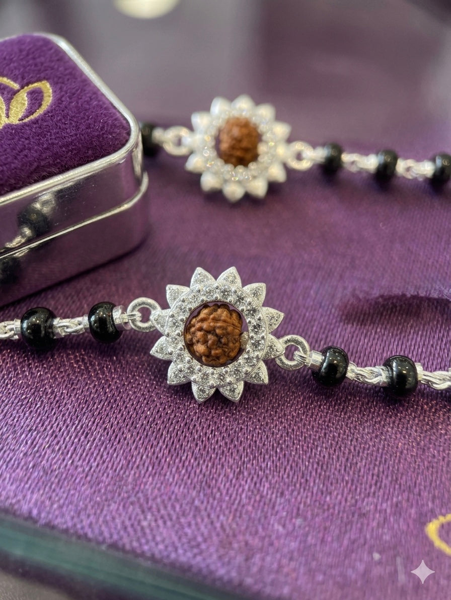 Silver nazariya with Black beads with flower and Rudraksha in center piece