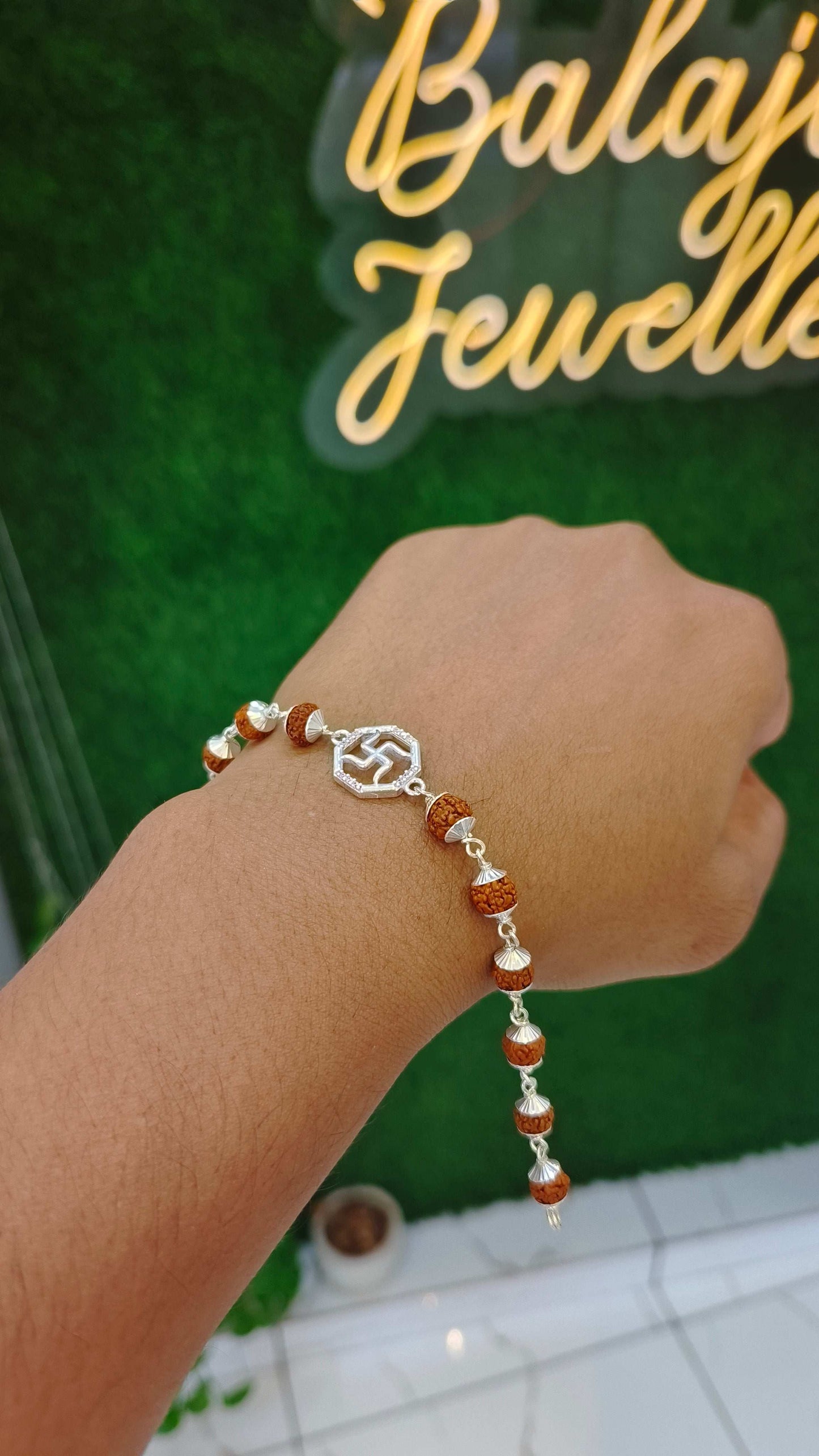 Pure Silver Rudraksha Bracelet with Swastik Charm