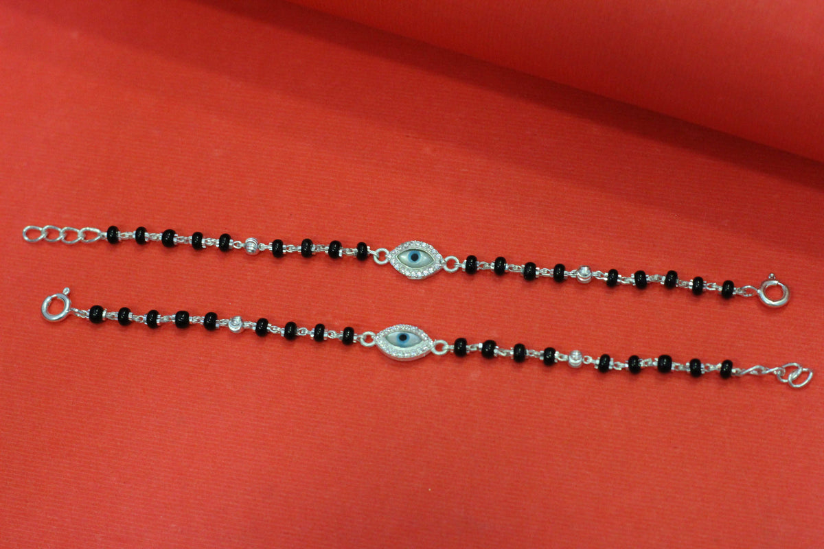 Silver nazariya with evil-eye centerpiece