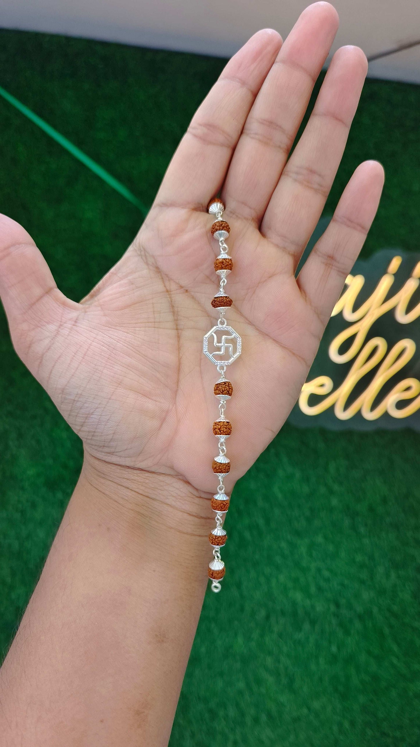 Pure Silver Rudraksha Bracelet with Swastik Charm