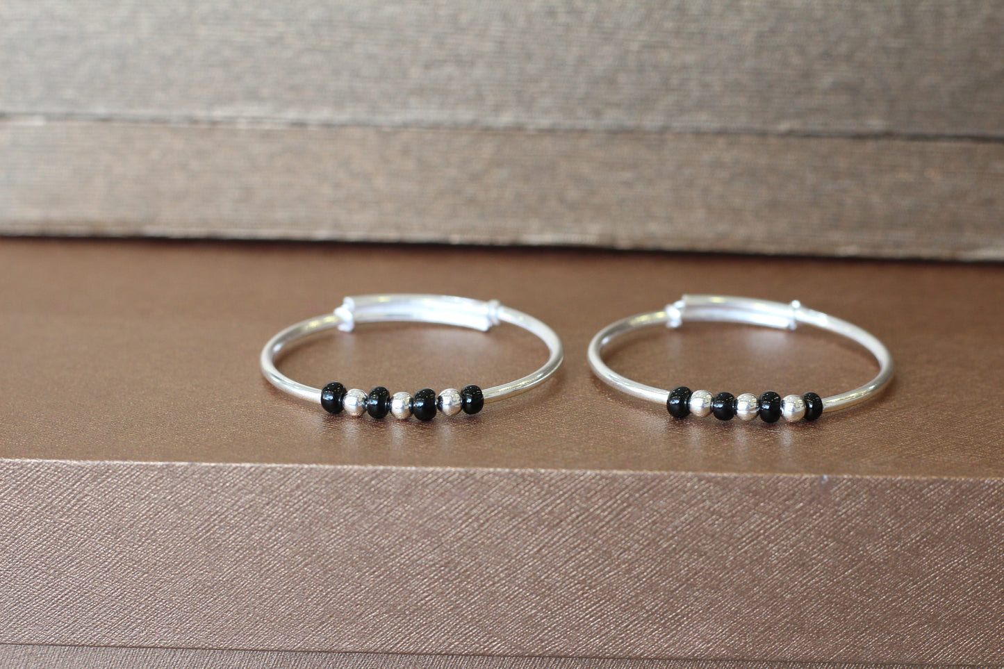 Silver adjustable bangles for kids in black beeds