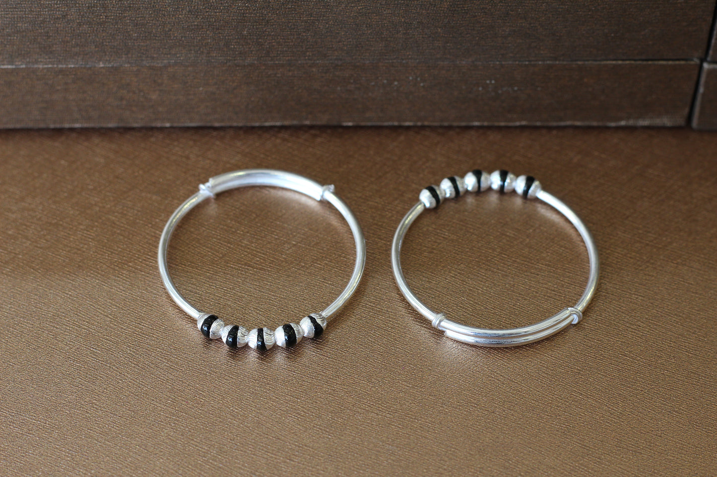Silver adjustable bangles for kids in black beeds