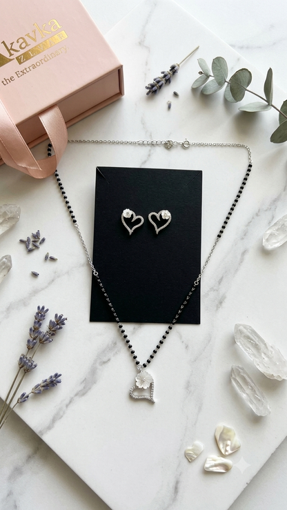 Silver Floral Modern Mangalsutra with matching earrings.