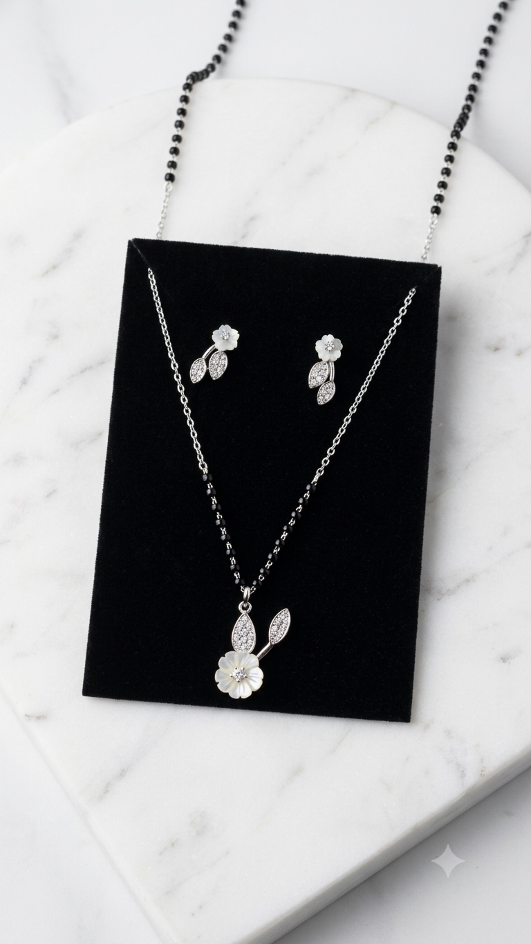 Silver Floral Modern Mangalsutra with matching earrings.