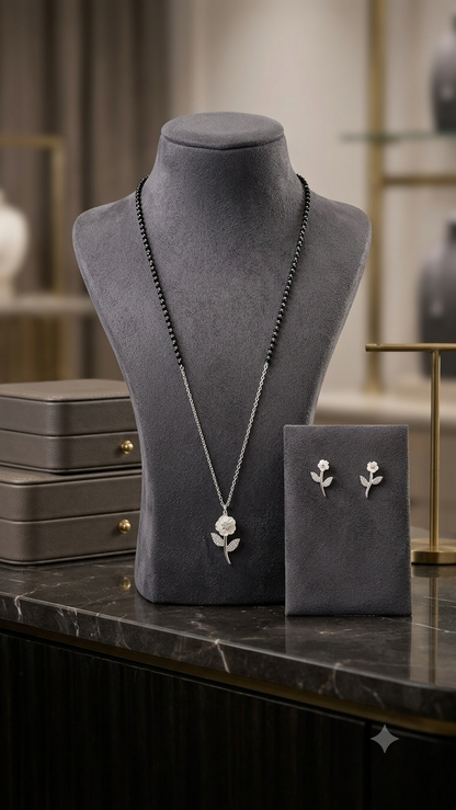 Silver Floral Modern Mangalsutra with matching earrings.