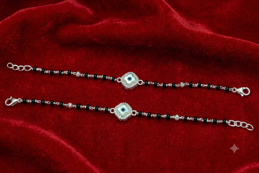 Silver nazariya with floral evil-eye centerpiece