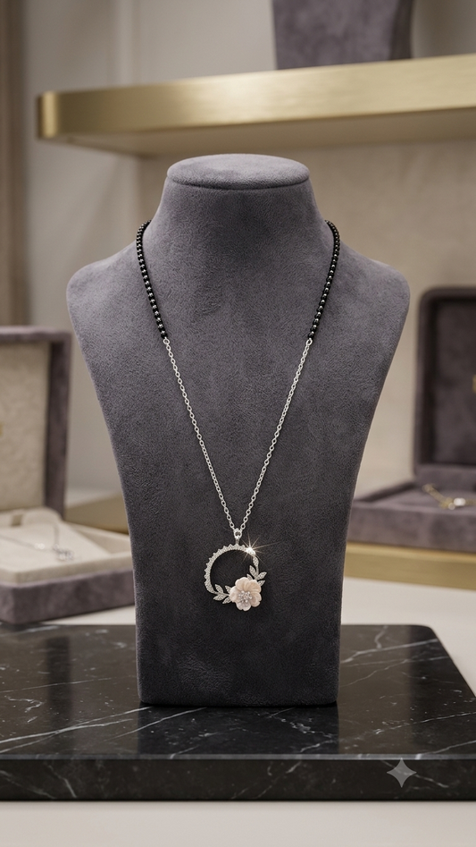 Silver Floral Modern Mangalsutra with matching earrings.