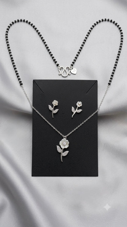 Silver Floral Modern Mangalsutra with matching earrings.