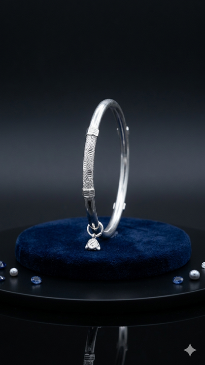 Silver Bangle with Textured Accents and Hanging Charm (one peice)