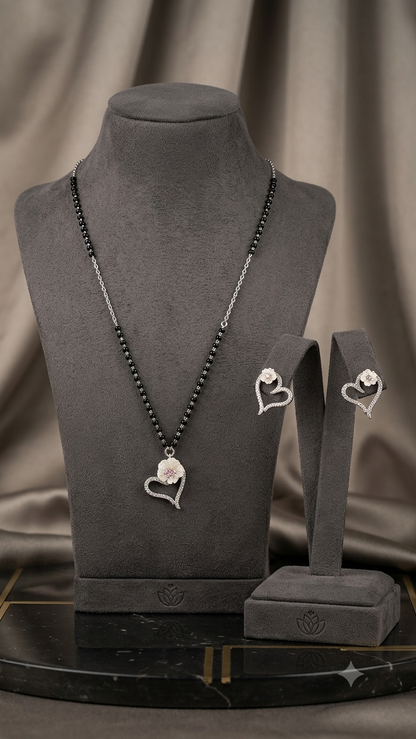 Silver Floral Modern Mangalsutra with matching earrings.