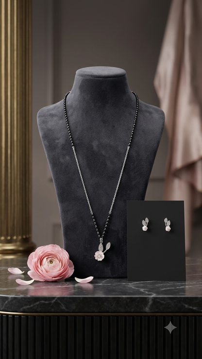 Silver Floral Modern Mangalsutra with matching earrings.