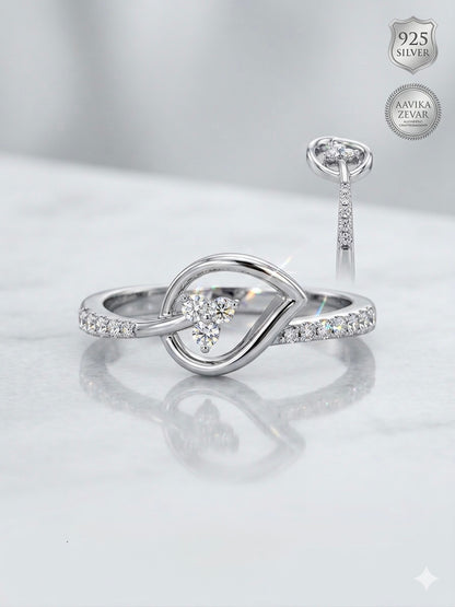 Infinite Grace: Sterling Silver Looped Knot Ring with Sparkling Diamond Accents
