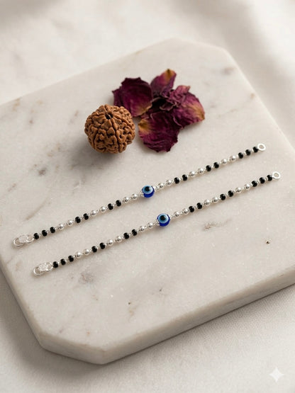 Silver nazariya with Black beads and evil eye center piece