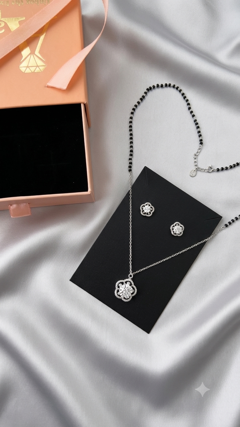 Silver Floral Modern Mangalsutra with matching earrings.