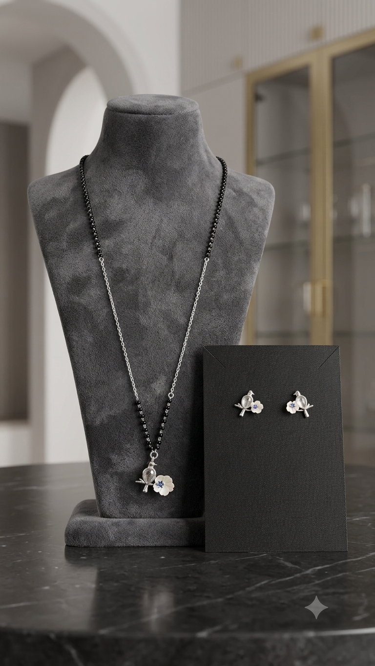 Silver Floral Modern Mangalsutra with matching earrings.