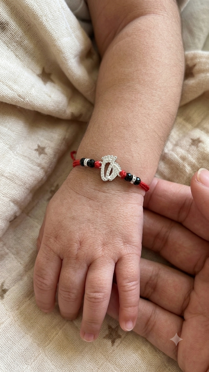 Silver footprint kid Rakhi