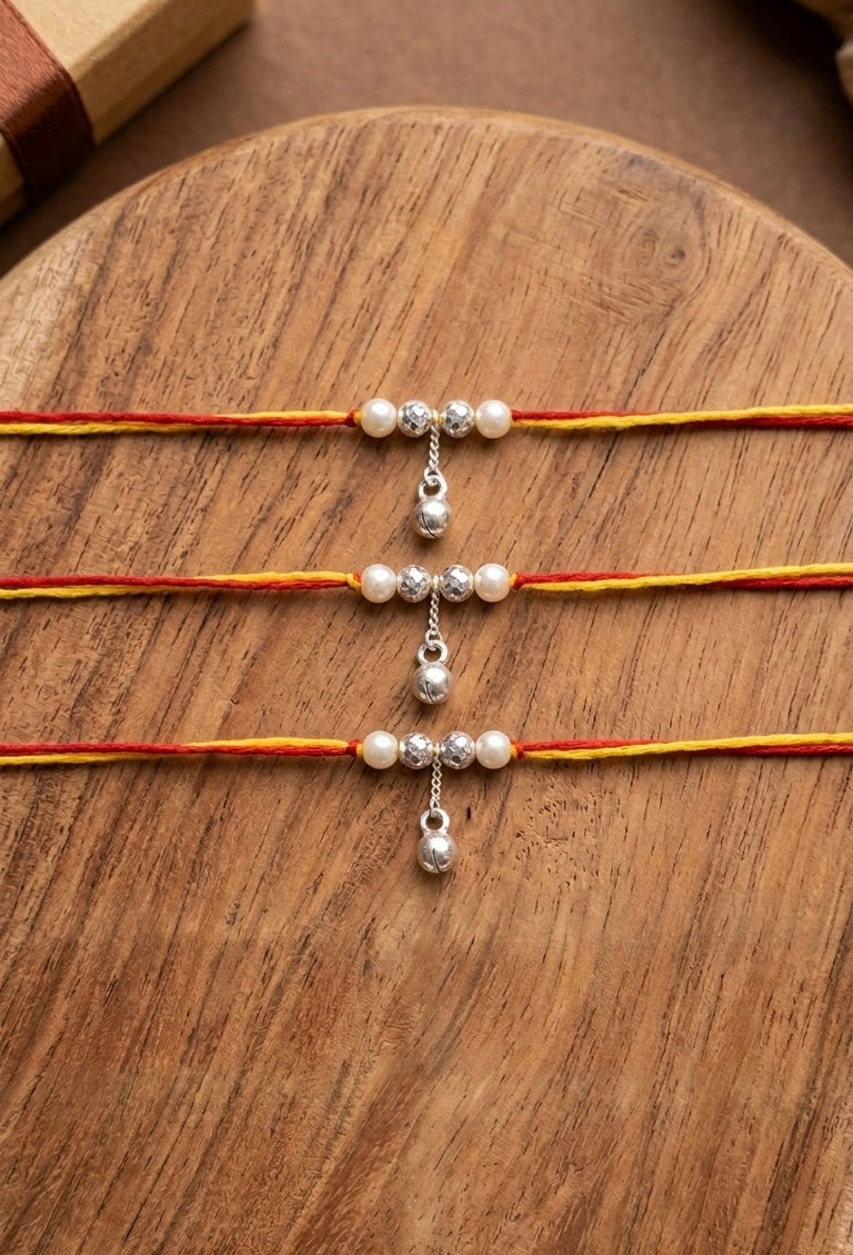 Elegant Pearl and Silver Bead Lumba Bhabhi Rakhi ( set of 3 )