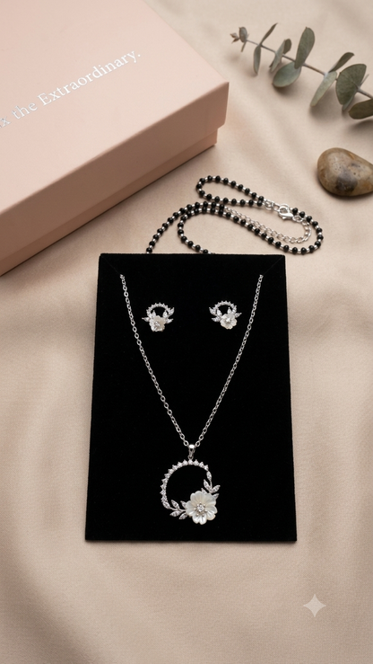 Silver Floral Modern Mangalsutra with matching earrings.