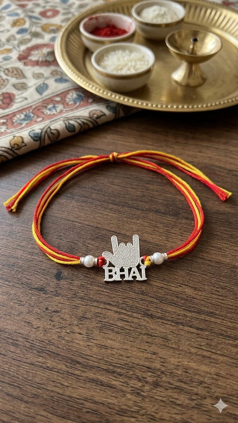 Silver "Bhai" Rock Sign Rakhi (Set of 3) – Sacred Mauli Thread with Pearl Accents
