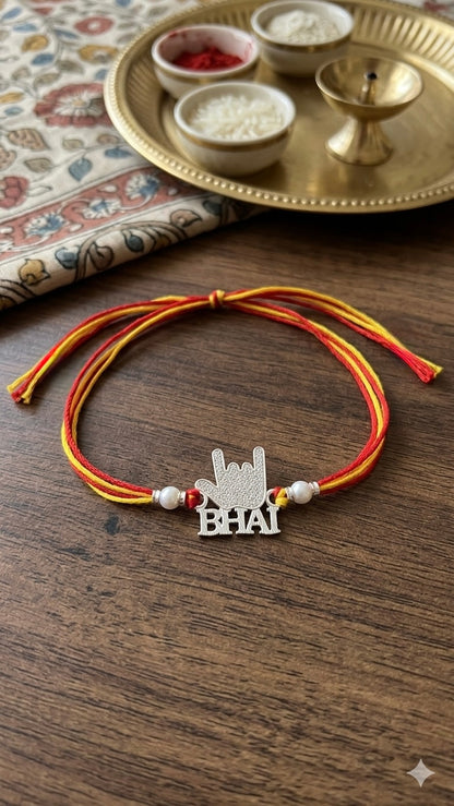 Silver "Bhai" Rock Sign Rakhi (Set of 3) – Sacred Mauli Thread with Pearl Accents