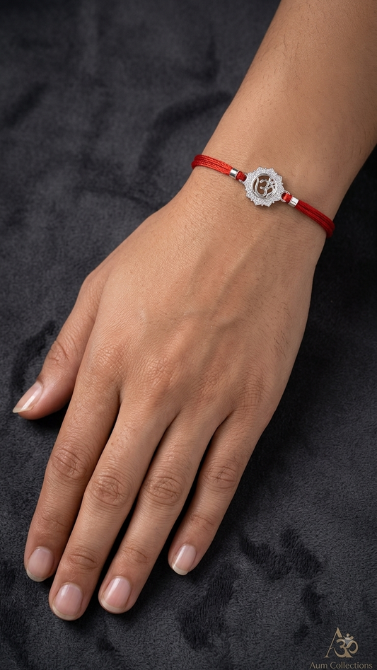 Silver Om CZ Motif Sacred Red Thread Rakhi ( set of 3/5 )