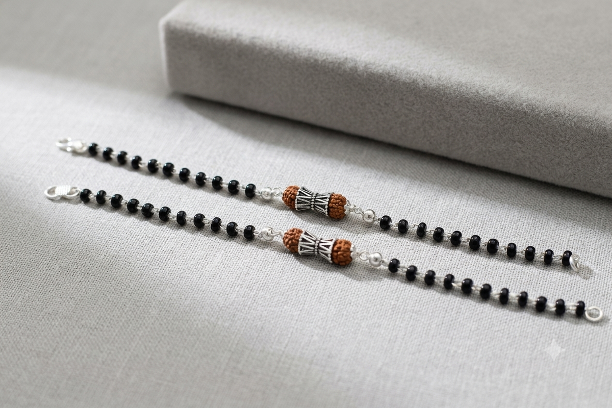 Silver nazariya with Black beads and Rudraksha center piece
