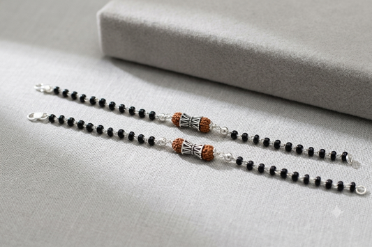 Silver nazariya with Black beads and Rudraksha center piece