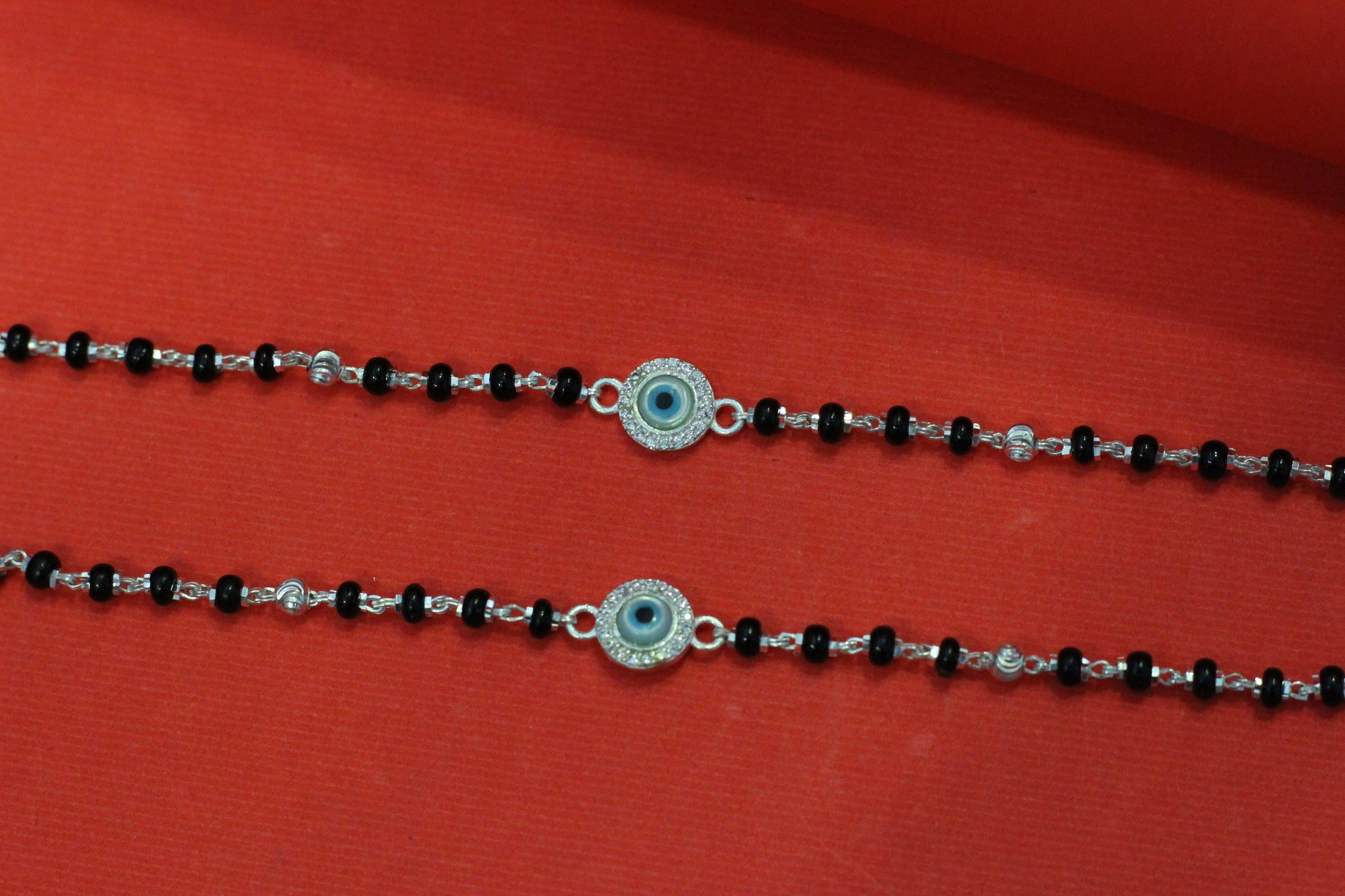 Silver nazariya with round evil-eye centerpiece