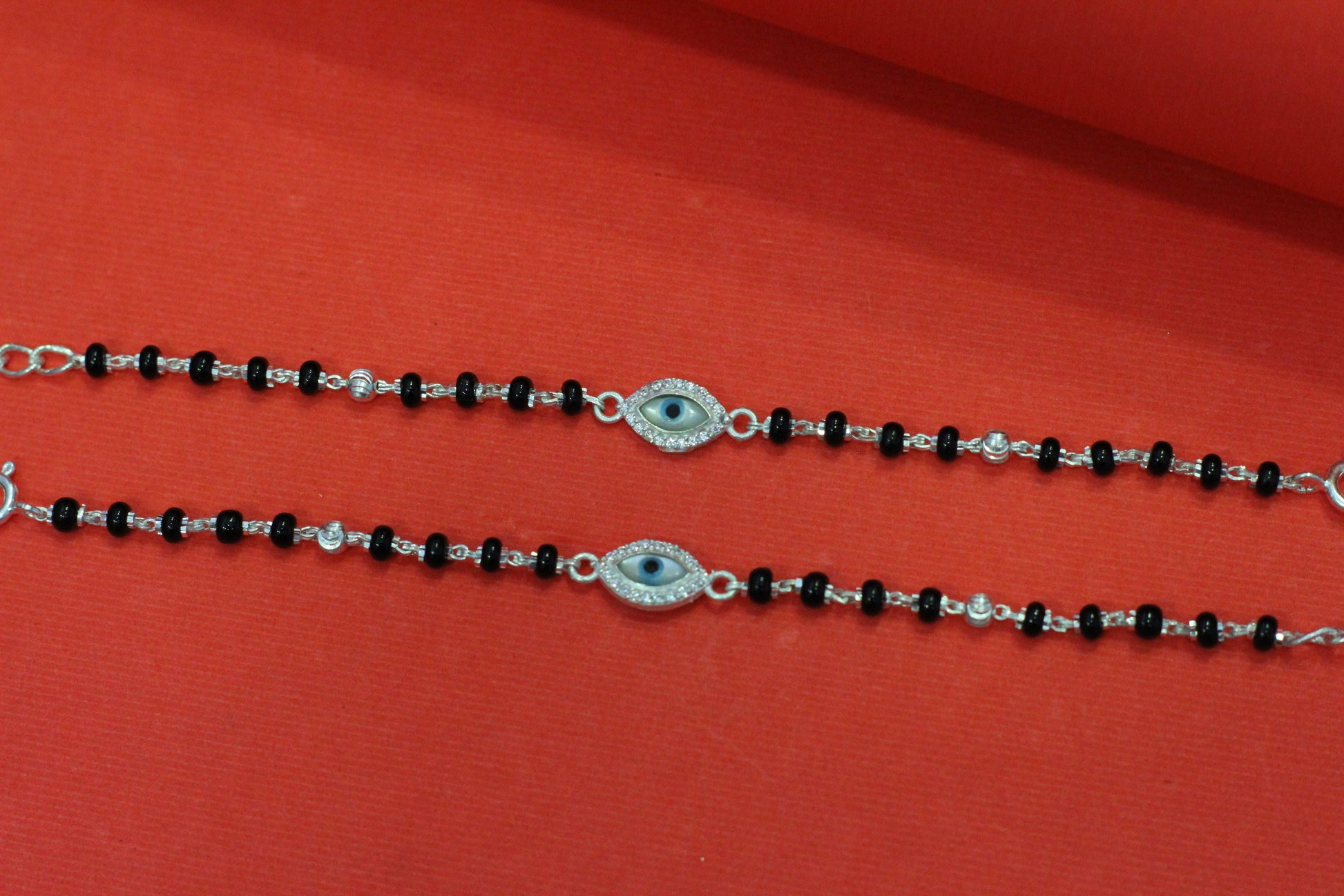 Silver nazariya with evil-eye centerpiece