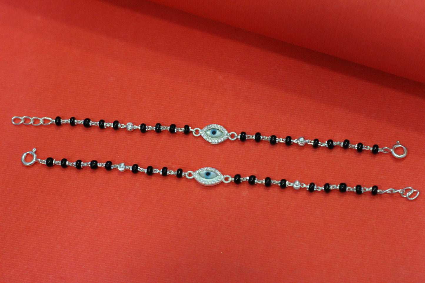Silver nazariya with evil-eye centerpiece