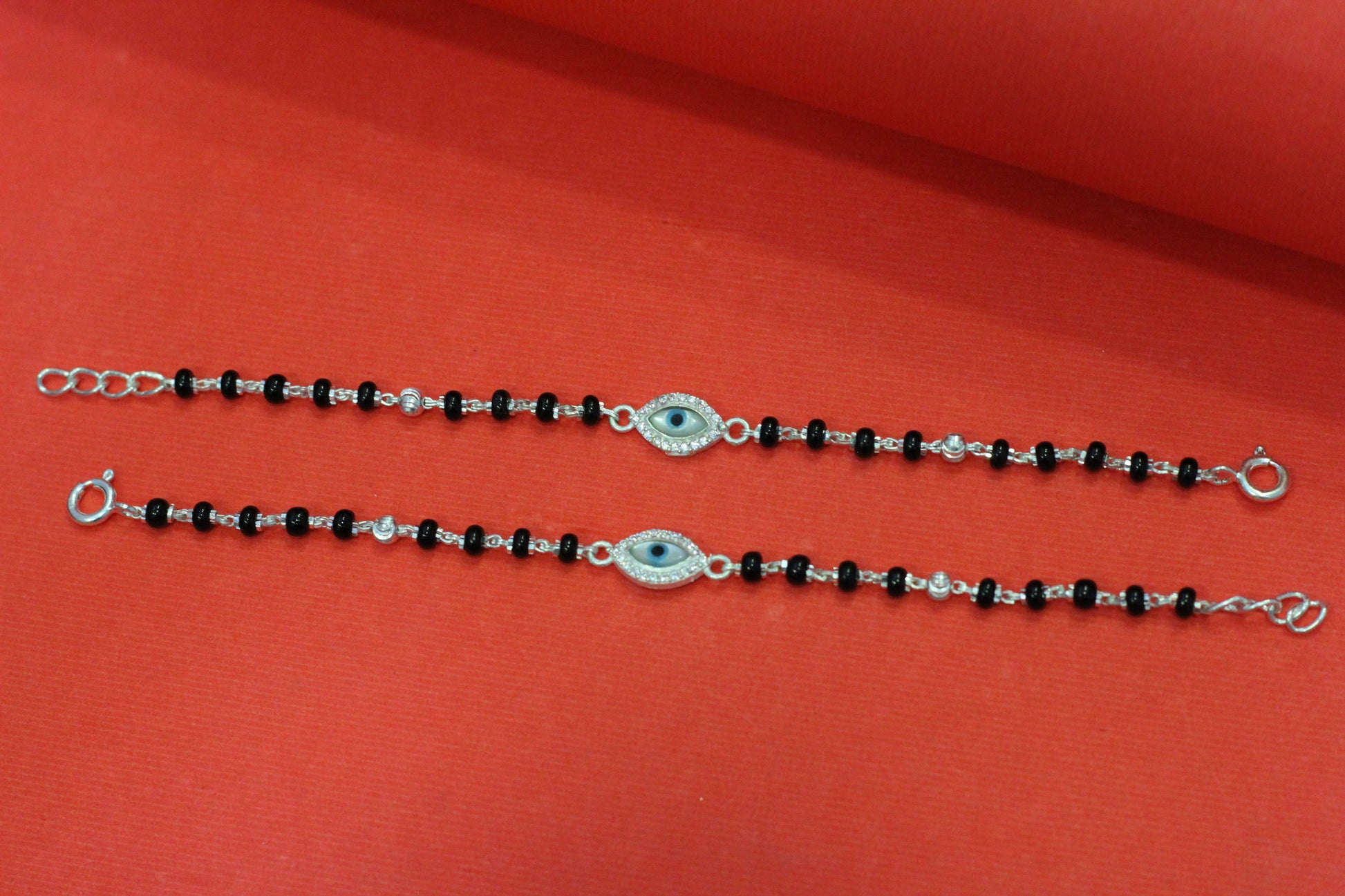 Silver nazariya with evil-eye centerpiece