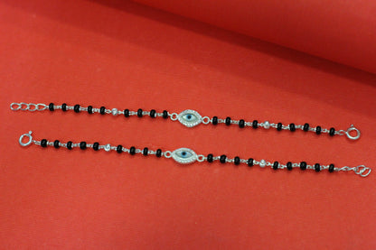 Silver nazariya with evil-eye centerpiece