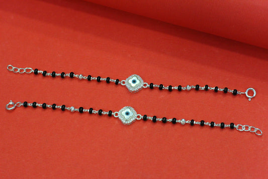 Silver nazariya with floral evil-eye centerpiece