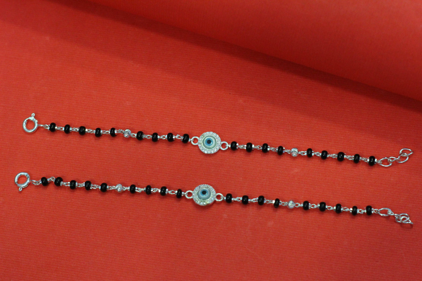 Silver nazariya with round evil-eye centerpiece