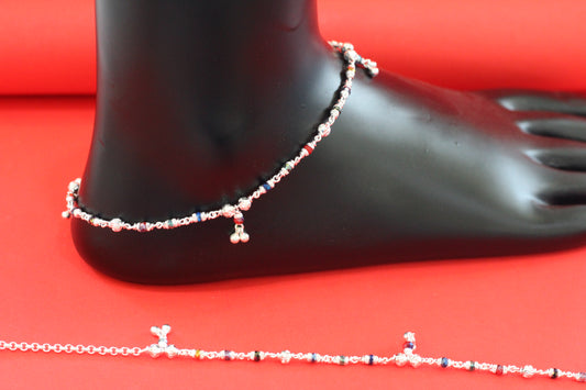 Lightweight silver anklet with small dangling colorful beads for a graceful look
