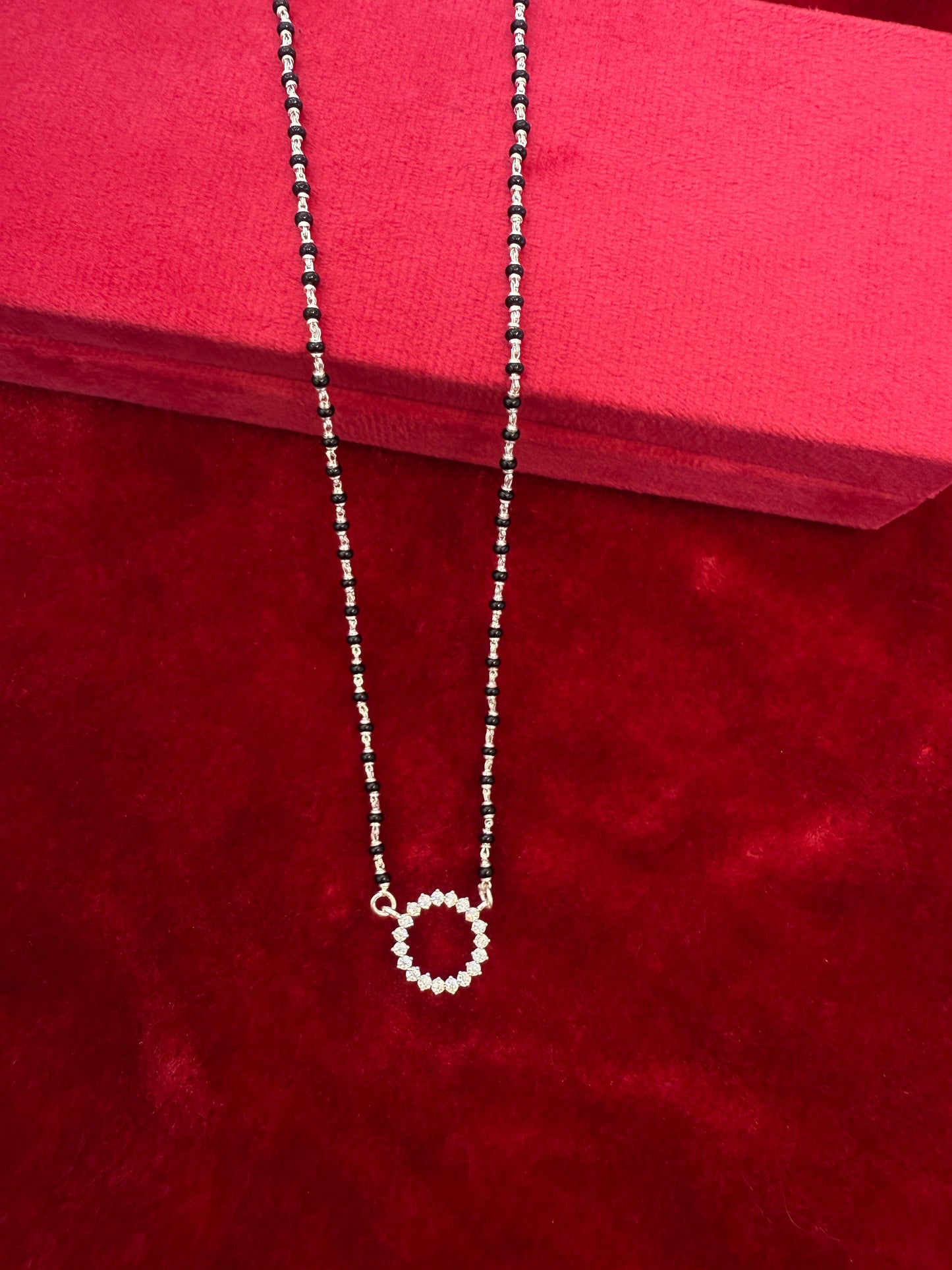 Royal Roots Traditional Silver Mangalsutra with round shape full dimond pendant