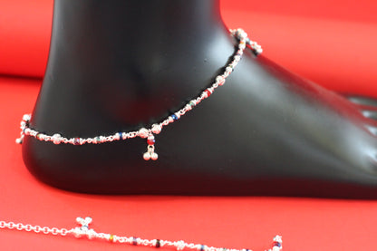 Lightweight silver anklet with small dangling colorful beads for a graceful look