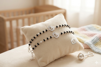 Silver nazariya with footprint charm at the center