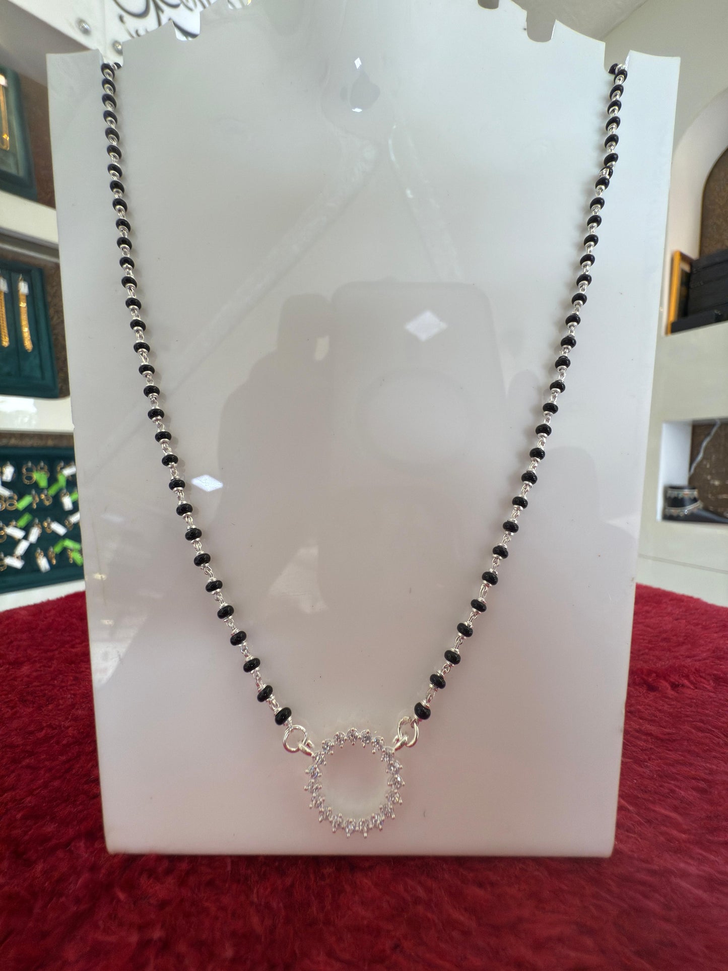 Royal Roots Traditional Silver Mangalsutra with round shape full dimond pendant