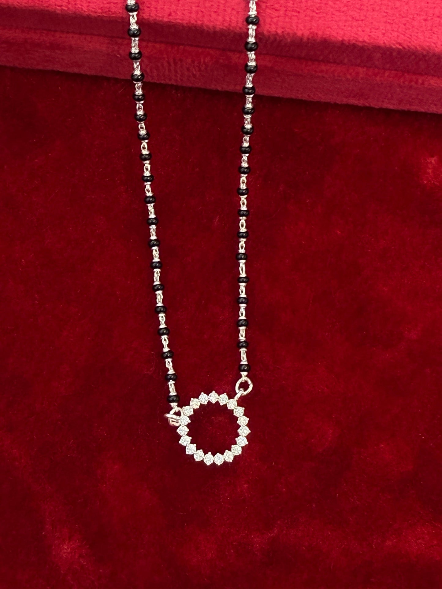 Royal Roots Traditional Silver Mangalsutra with round shape full dimond pendant