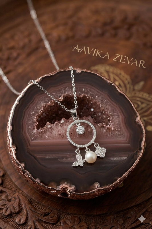 Aavika Zevar Silver Dreamcatcher Charm Necklace with Pearl and Butterfly Accents | Fancy Multi-Charm Cubic Zirconia Pendant for Women